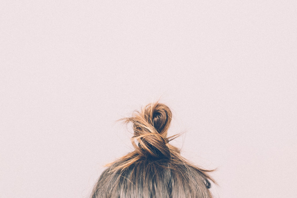hair bun - how to prevent hair loss 